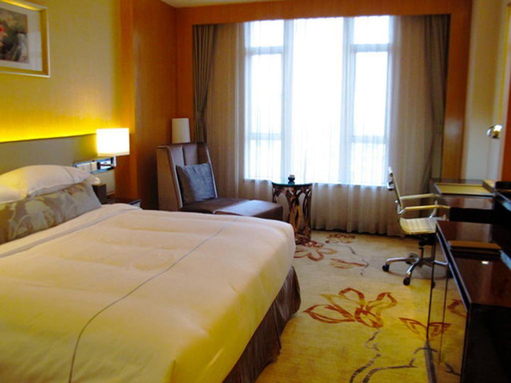 Guangzhou Manguo Internation Hotel Номер фото