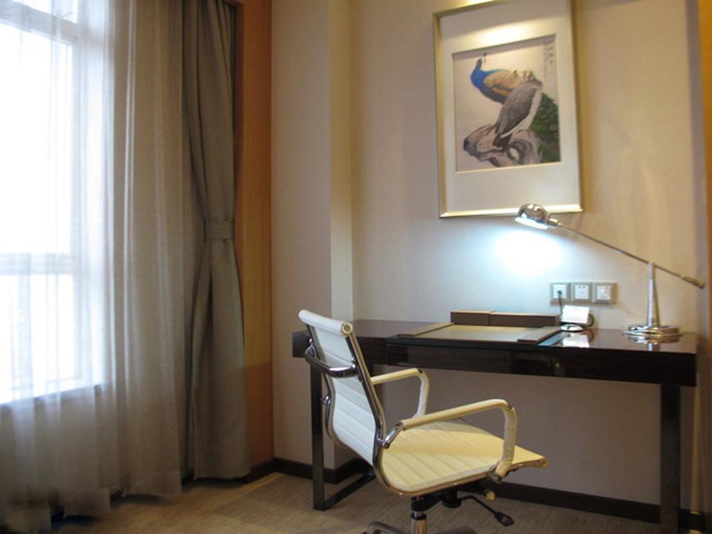 Guangzhou Manguo Internation Hotel Номер фото